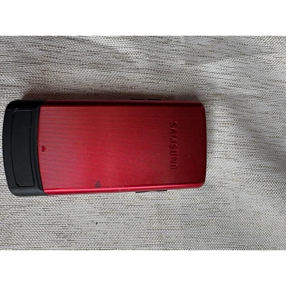 red Samsung SGH-A777, a 3G slider phone